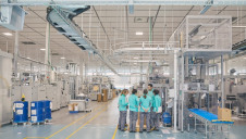 PMI workers at a factory in Bologna. Image: PMI